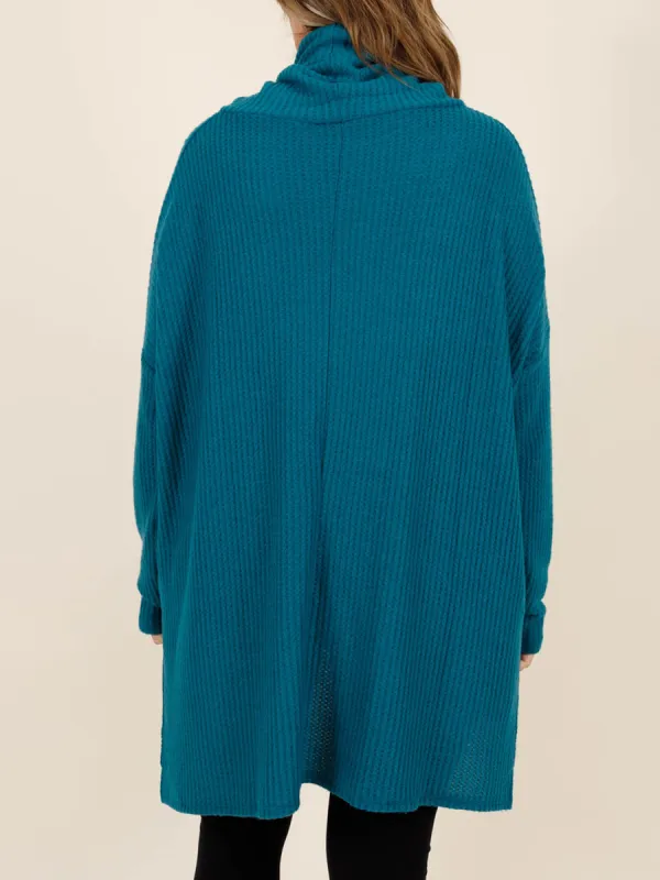 Blue green front short back long loose fitting sweater