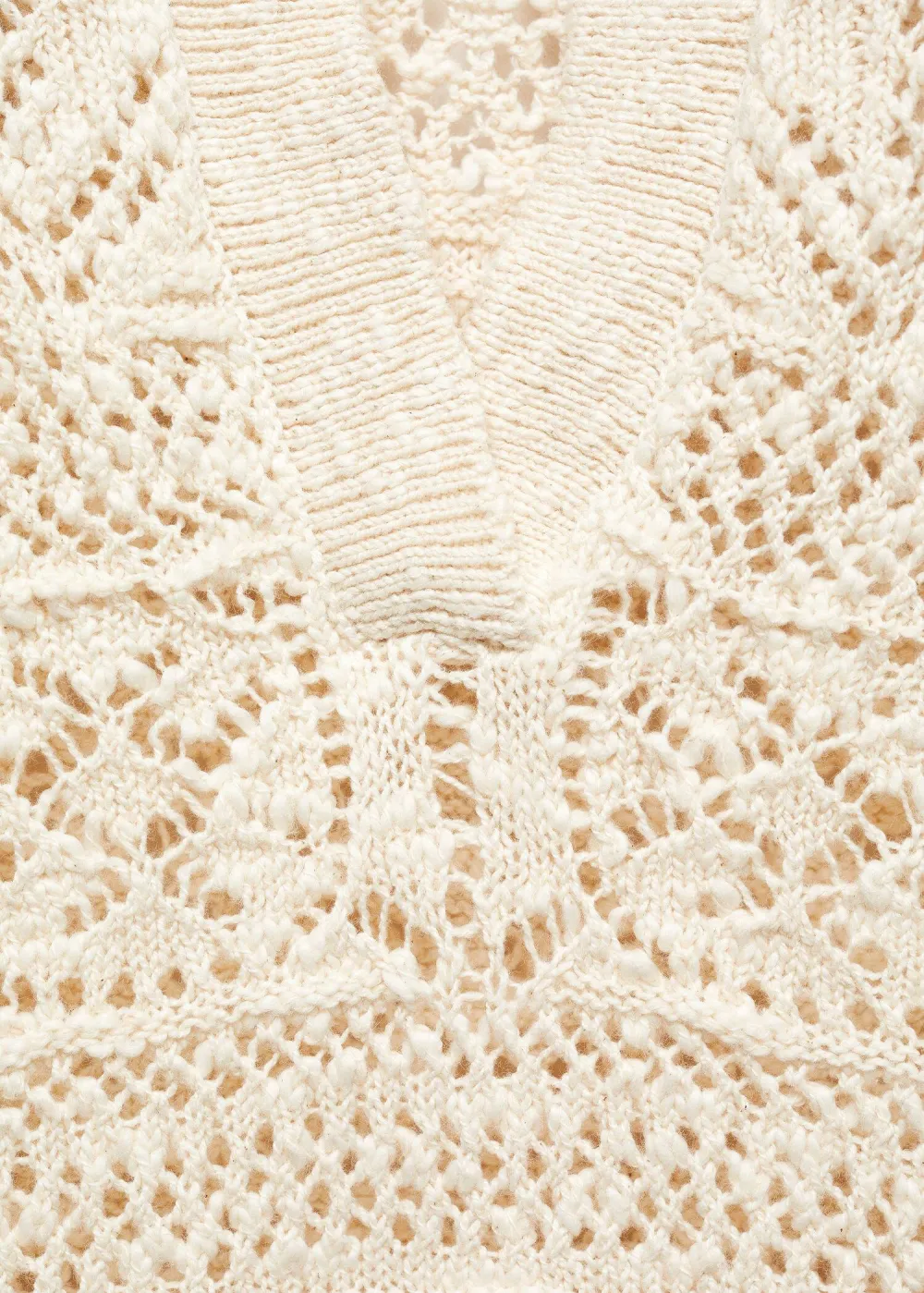 Knitted jumper with openwork details