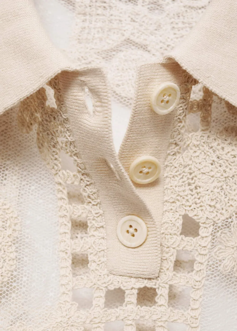 Embroidered blouse with openwork details