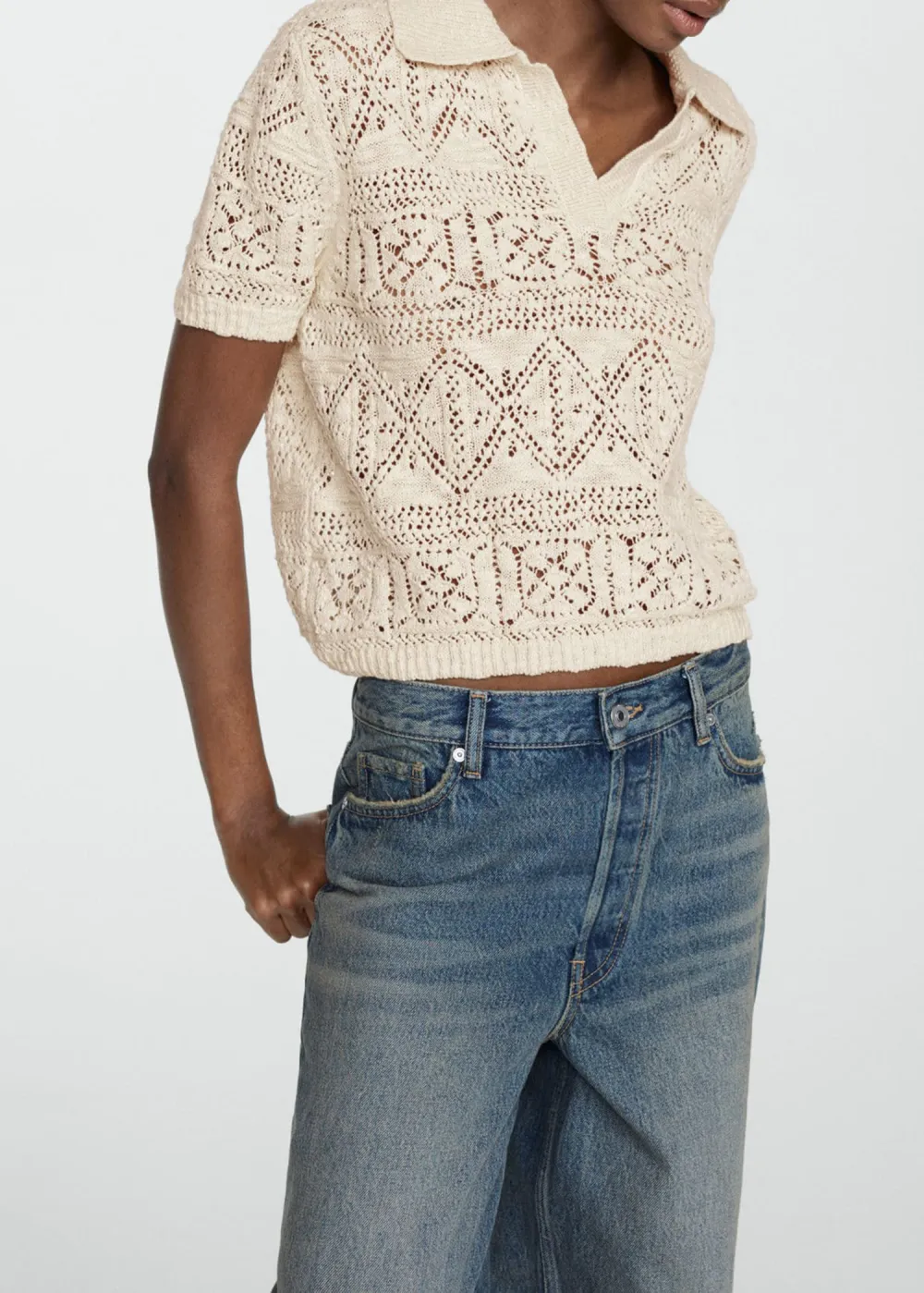 Knitted jumper with openwork details